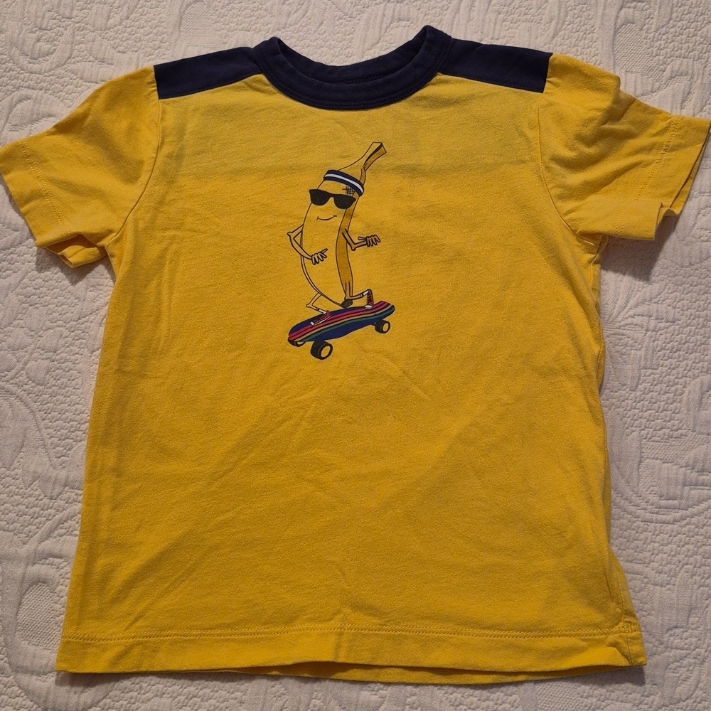 Hanna Andersson boys size 110 or 5 yellow shirt banana on a skateboard, pin hole
